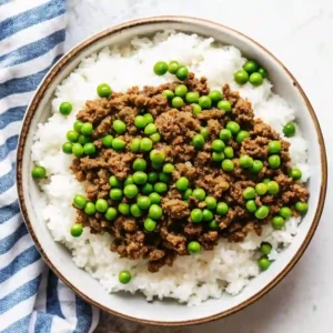 Gingery ground beef soboro donburi rice bowl with peas