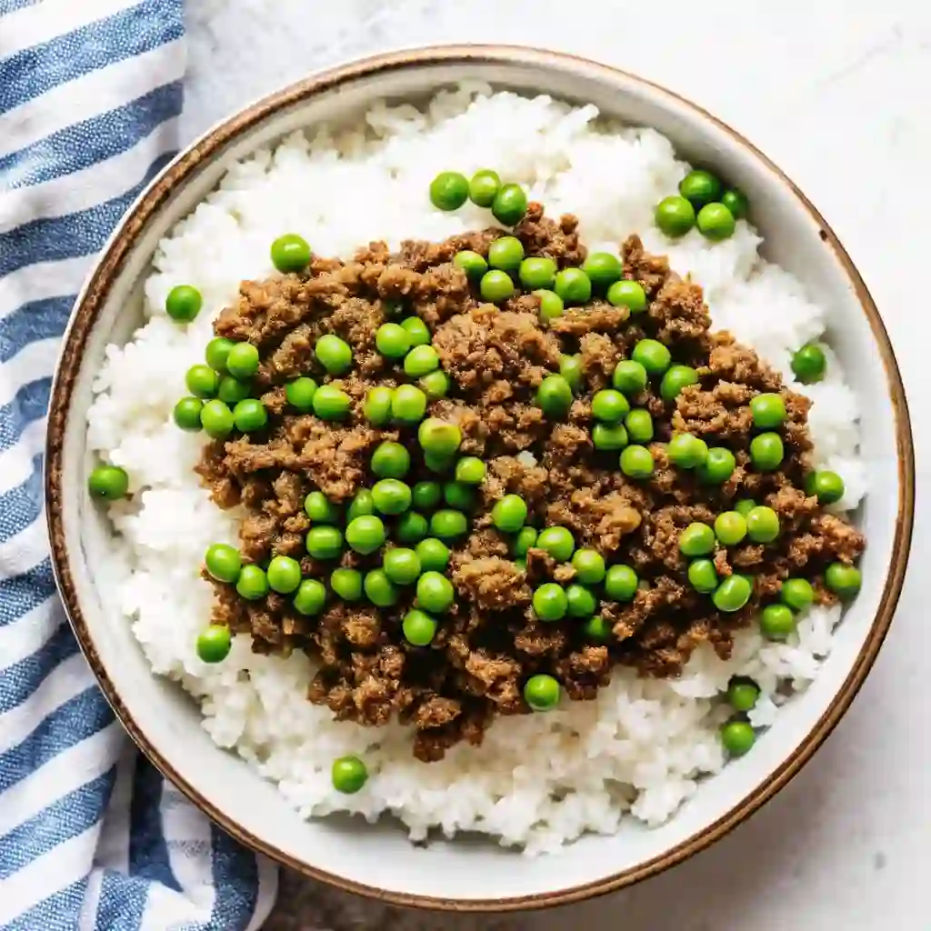 Gingery ground beef soboro donburi rice bowl with peas