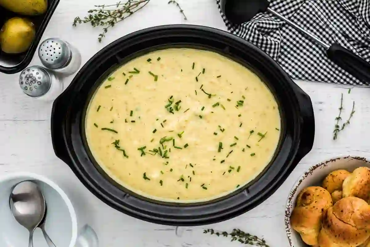 Slow Cooker Potato Leek Soup (Rich, Creamy & Foolproof) 12 Creamy slow cooker potato leek soup garnished with fresh chives