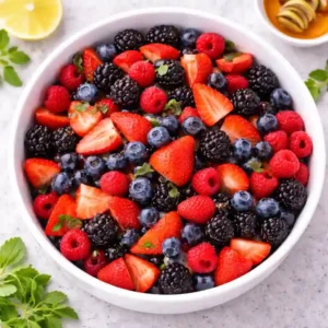 Berry Fruit Salad Recipe Best Easy Fresh Bowl 1 Bright overhead berry fruit salad recipe with strawberries blueberries raspberries and blackberries