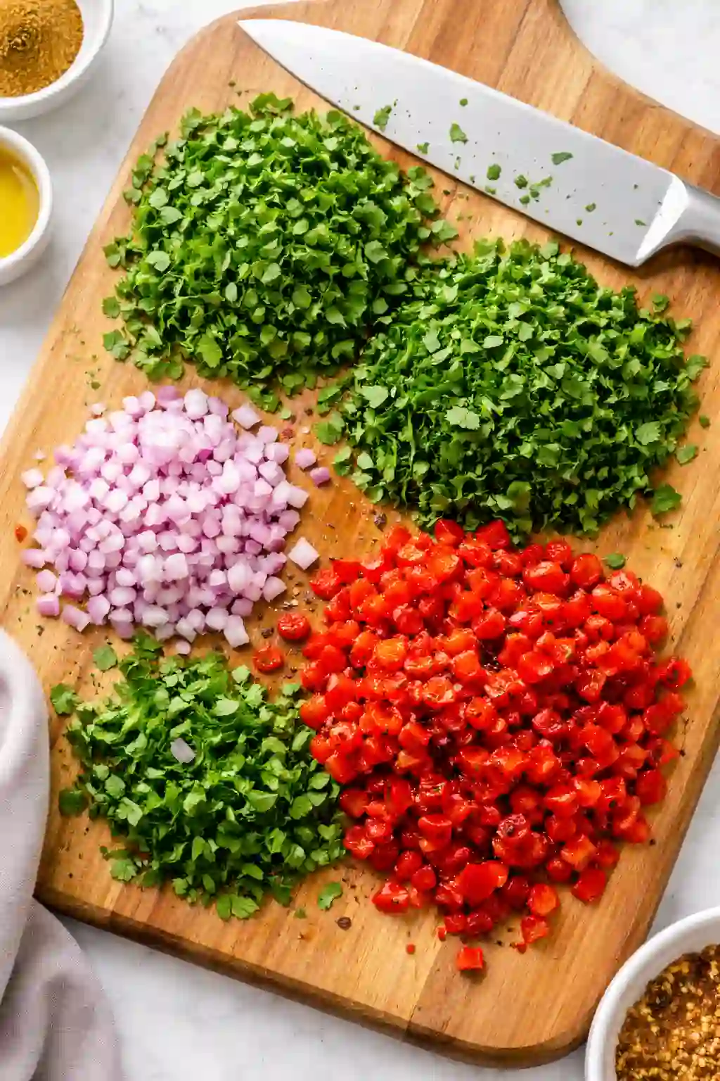 Whisking harissa lemon garlic dressing in a bowl for dense bean salad