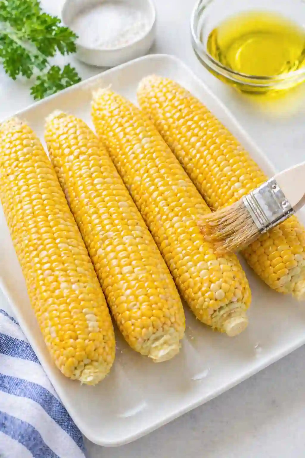 corn on the cob brushed with oil before grilling
